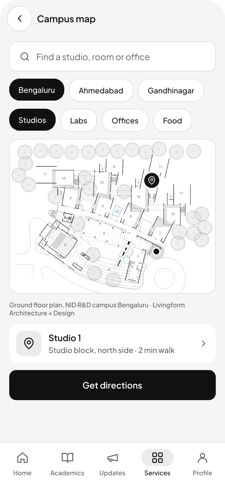 The campus map uses the real NID Bengaluru floor plan, with a pin on the studio and a dot at the entrance.